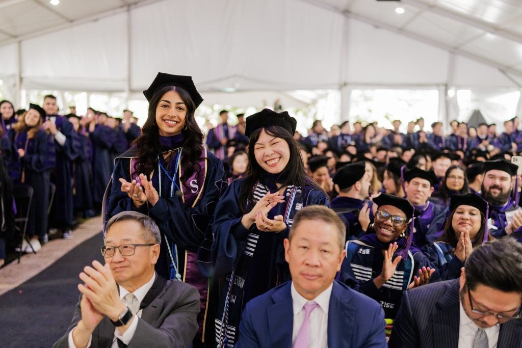 Graduates in robes at commencement