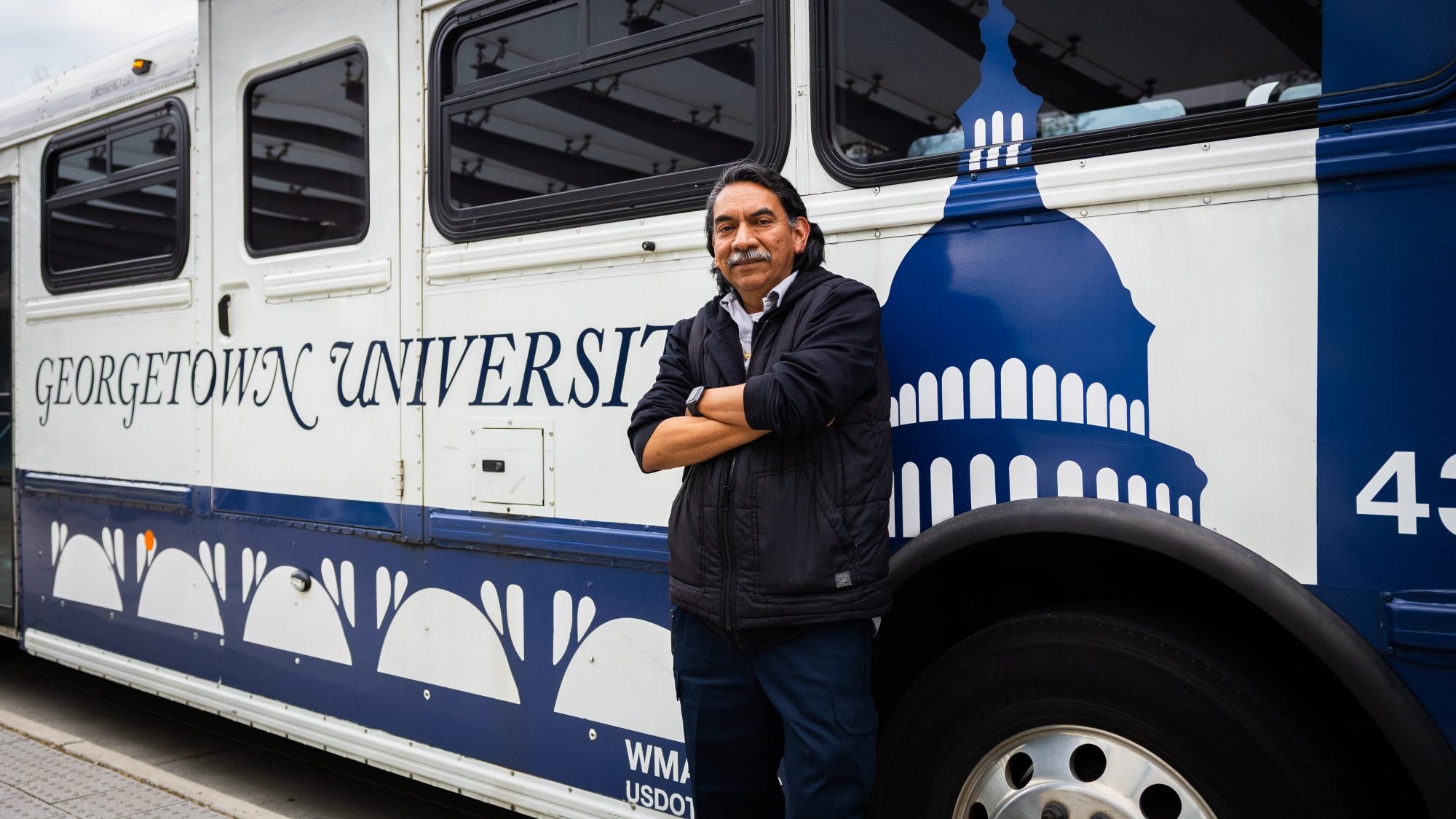 Robinson next to a GUTS bus