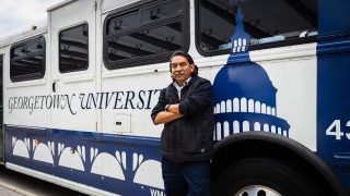 Robinson next to a GUTS bus