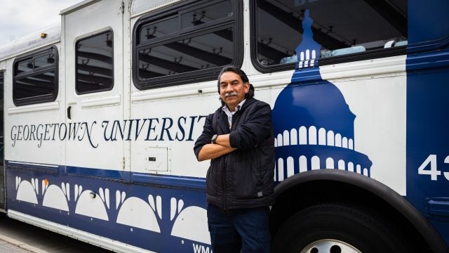 Robinson next to a GUTS bus