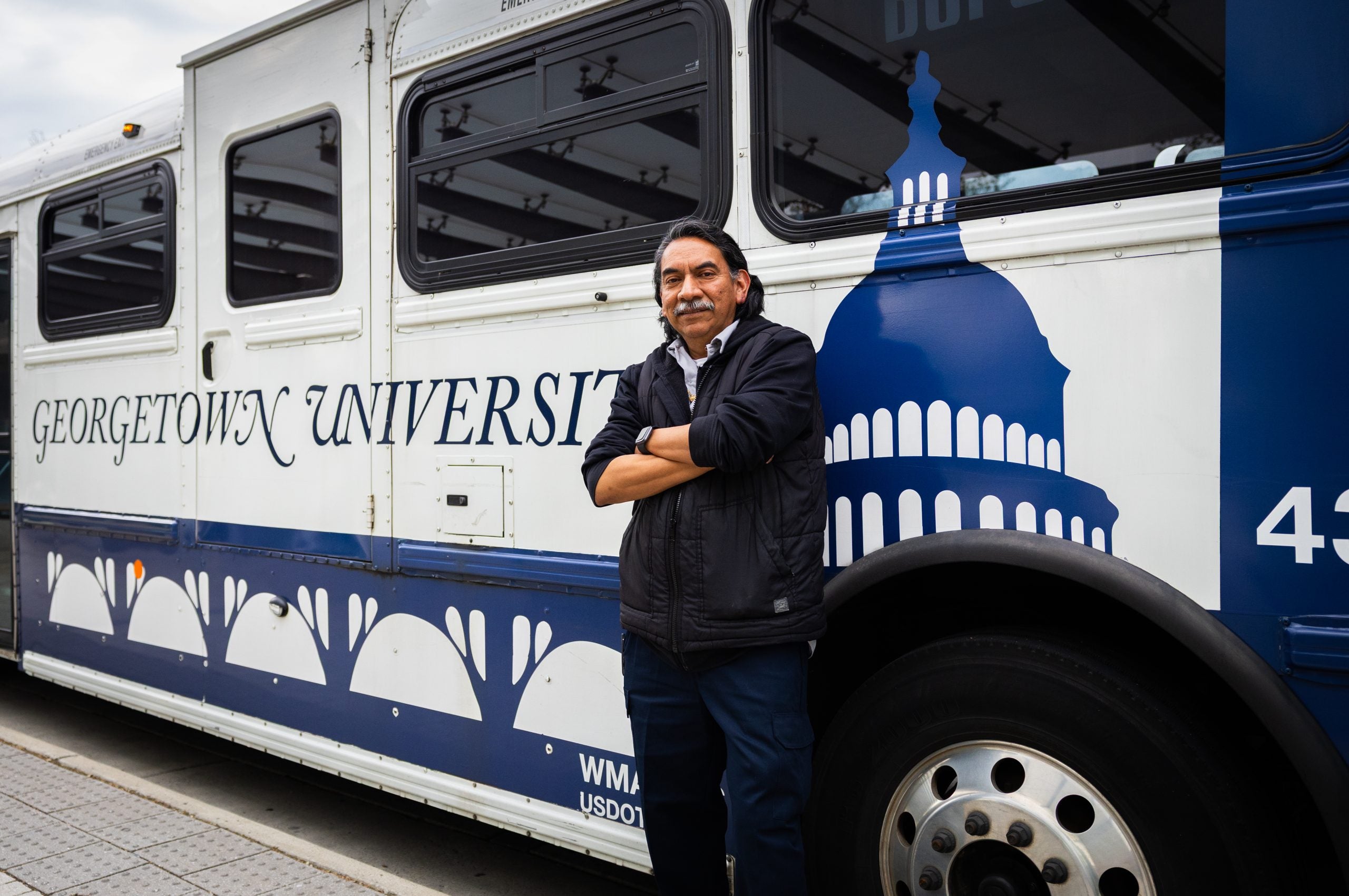 Robinson next to a GUTS bus