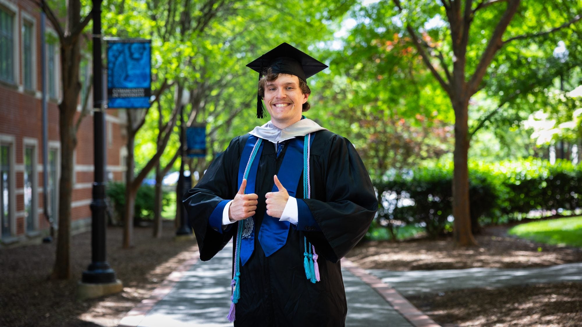 Labranche in graduation regalia