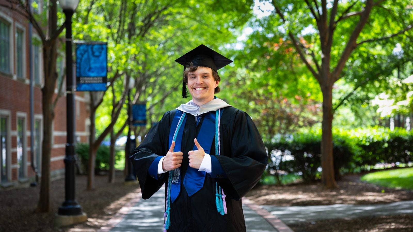 Labranche in graduation regalia