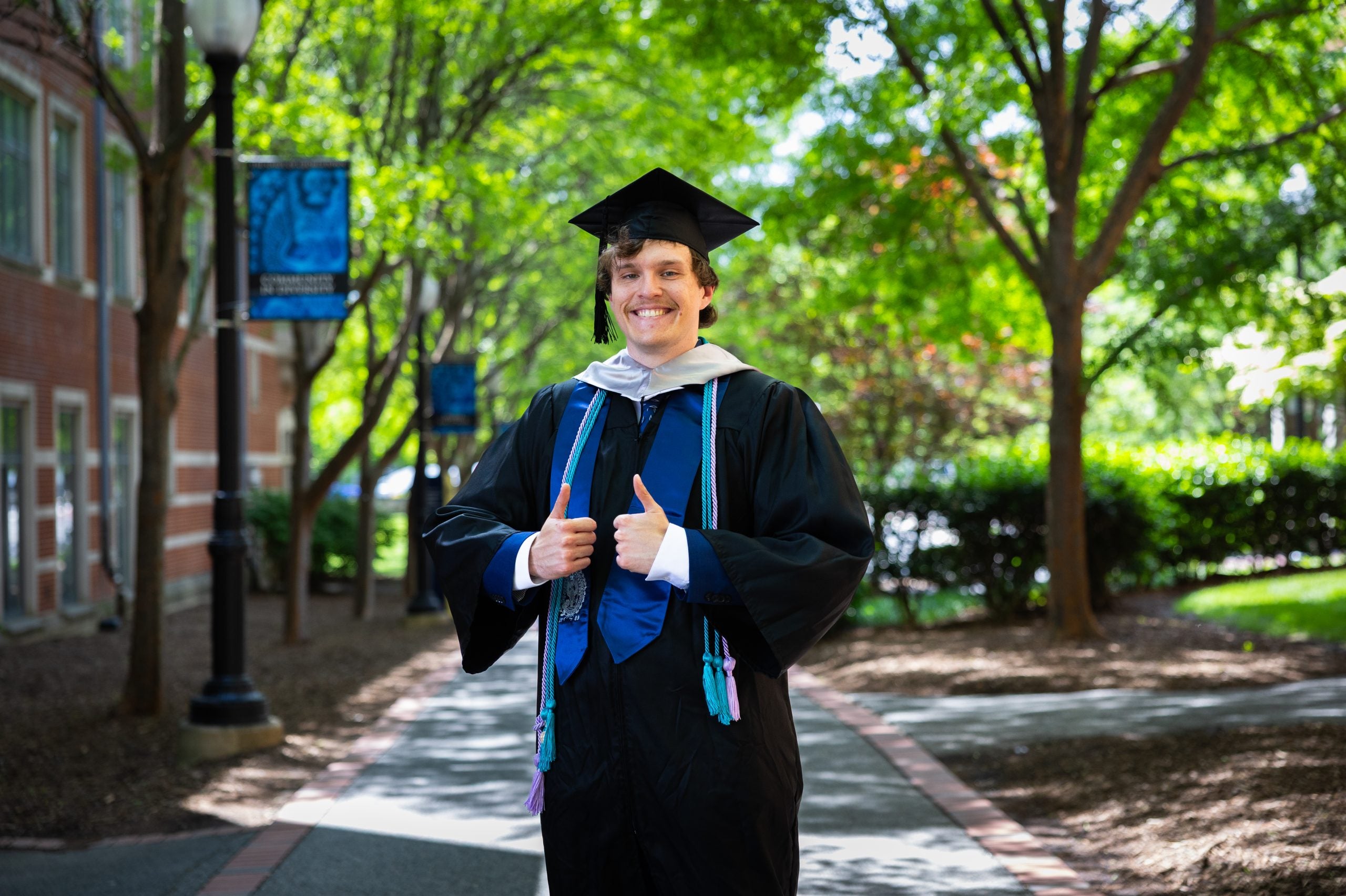 Labranche in graduation regalia
