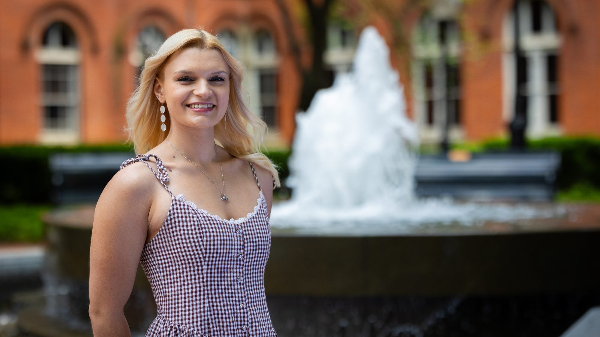 Lisa in a dress in Dahlgren Quad