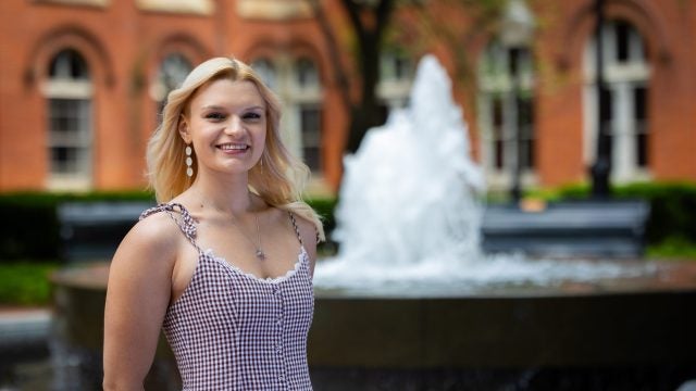 Lisa in a dress in Dahlgren Quad