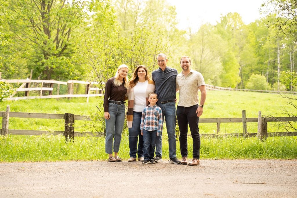 Lisa with her family outside