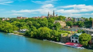 The Potomac River and Georgetown&#039;s campus on a sunny day