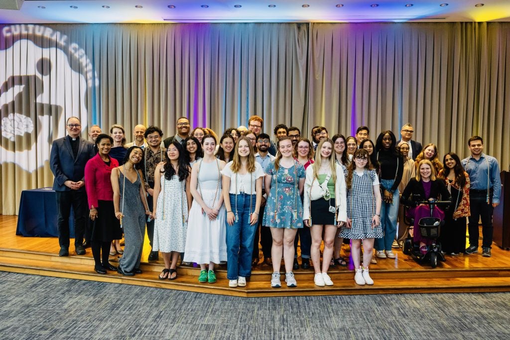 A group of students at a celebration during commencement weekend
