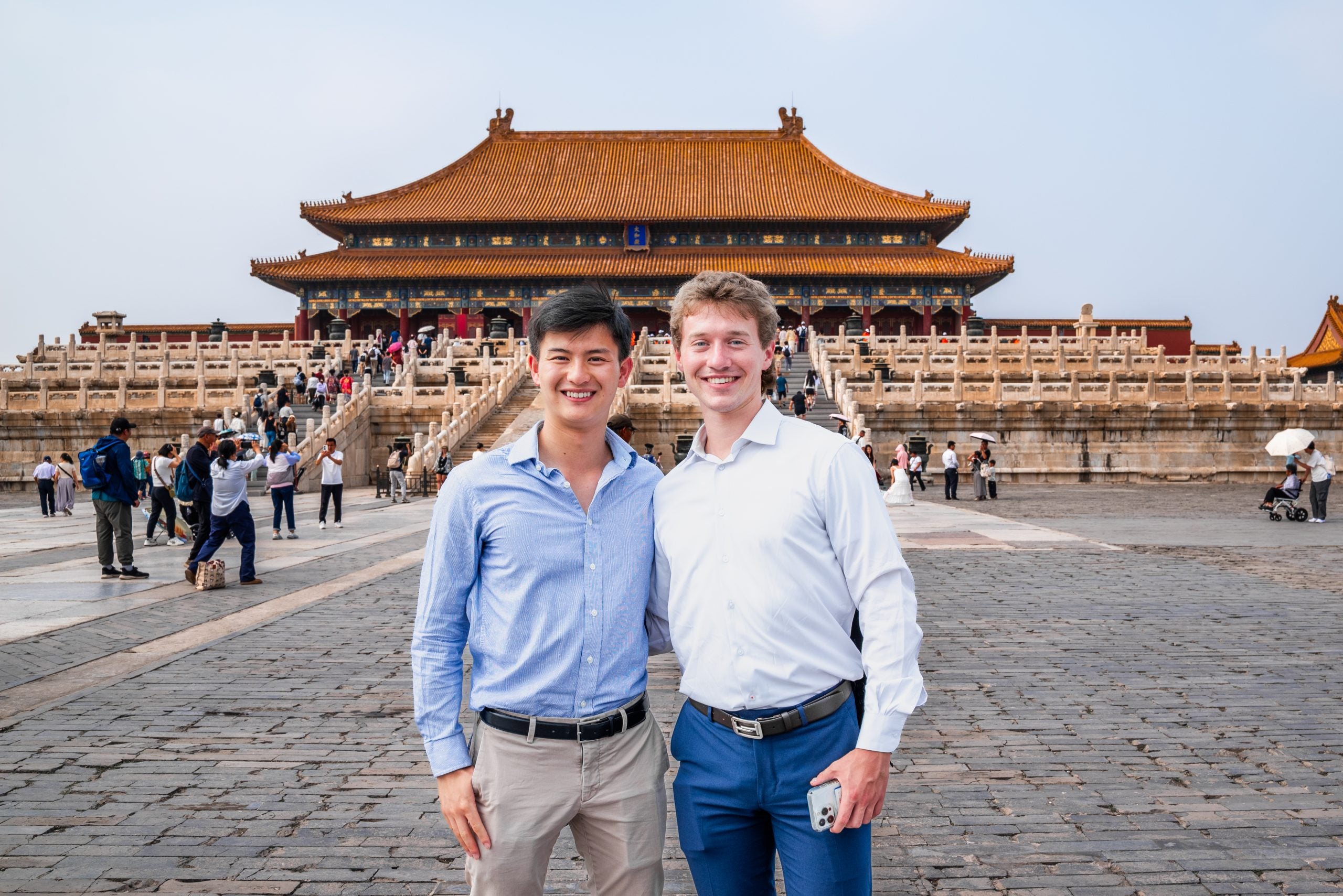 Bennie and Luke in front of a palace