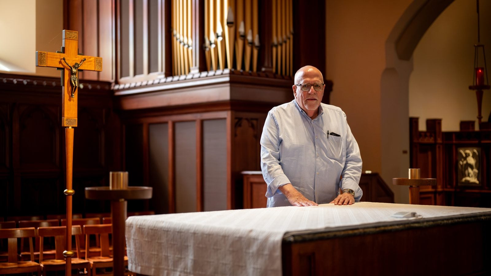 Ray Kemp at the altar in Dahlgren Chapel