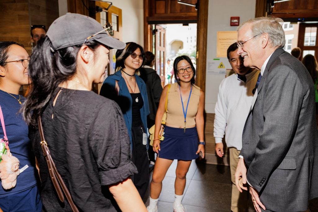 A group of students and parents meet Georgetown's Interim President Robert M. Groves