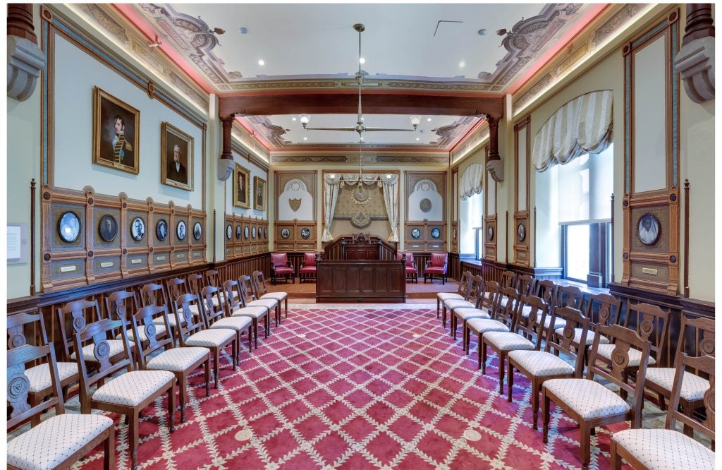 Georgetown's Philodemic Room with chairs and a rostrum
