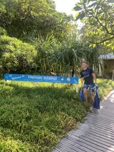 Young Caucasian man with a SFS shirt and diving gear