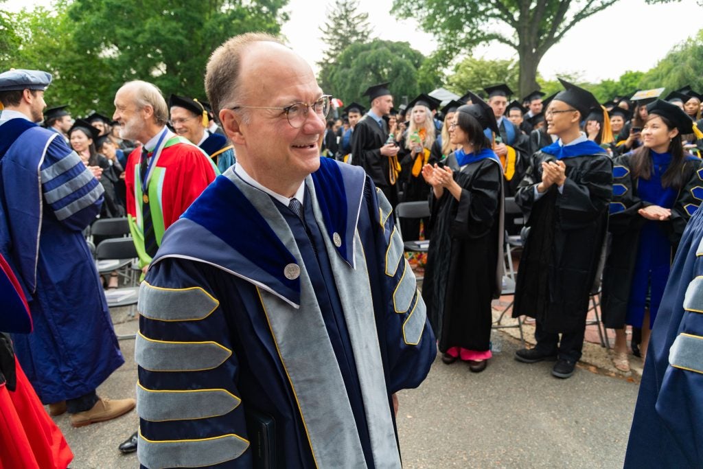 President DeGioia wears an academic robe at a commencement ceremony in 2019