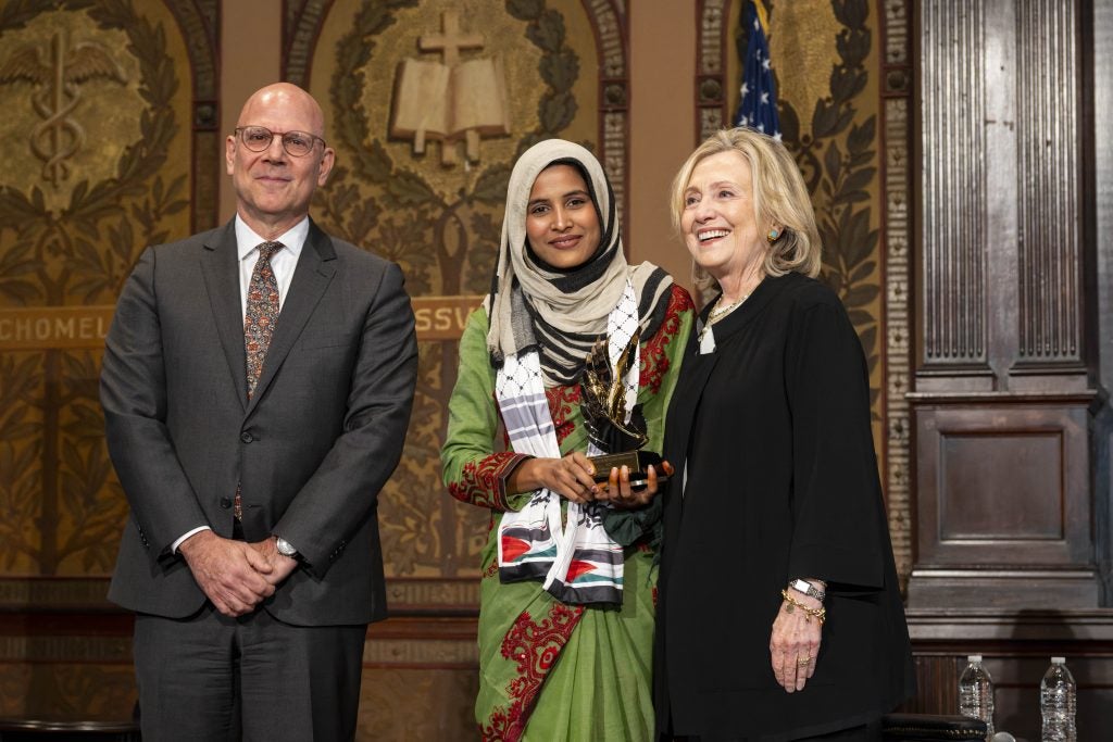 Hillary Clinton with Joel Hellman and Tanjina Tammim Hapsa