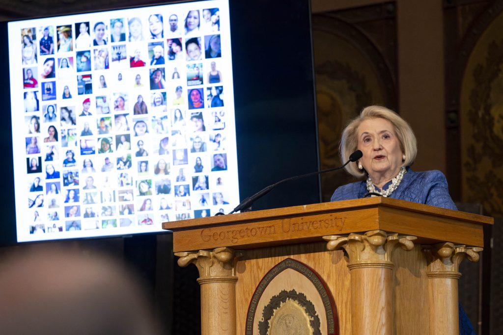 Melanne Verveer speaks at the podium in Gaston Hall