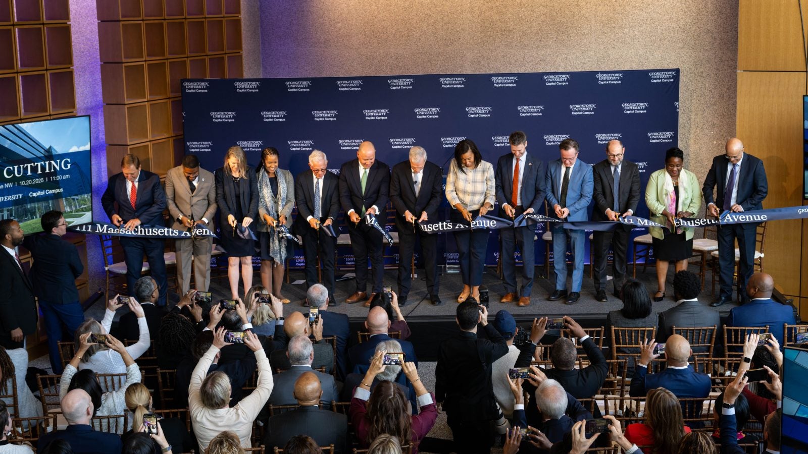 University and city leaders cut a ribbon