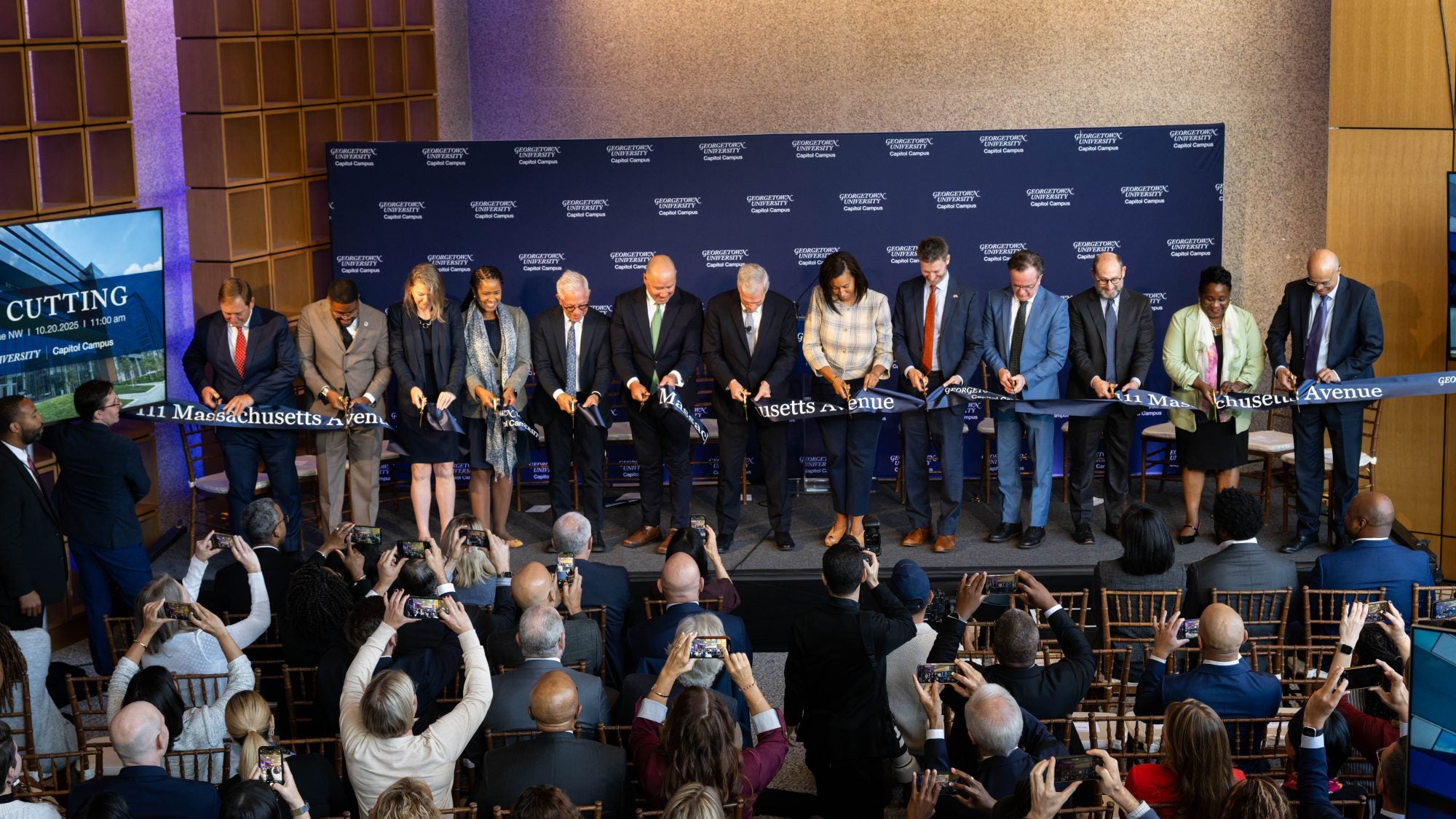 University and city leaders cut a ribbon