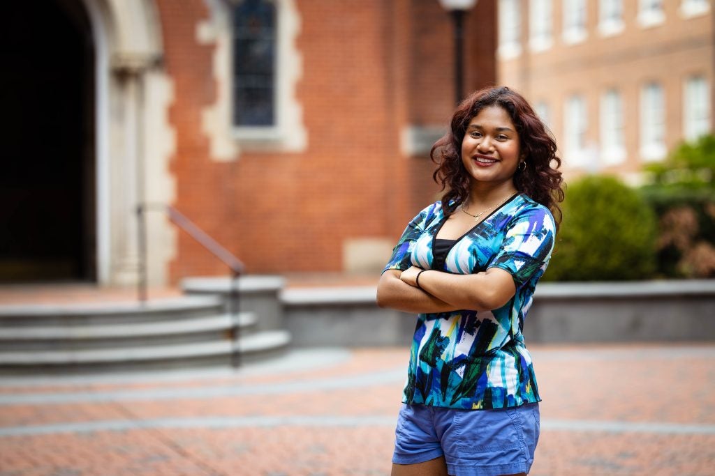 Mariela in a blue blouse in Dahlgren Quad