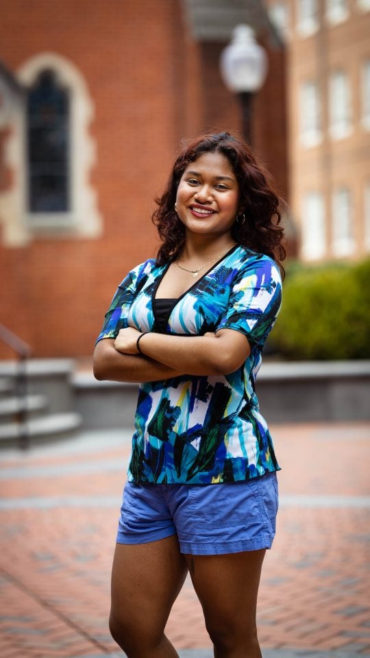 Mariela in a blue blouse in Dahlgren Quad