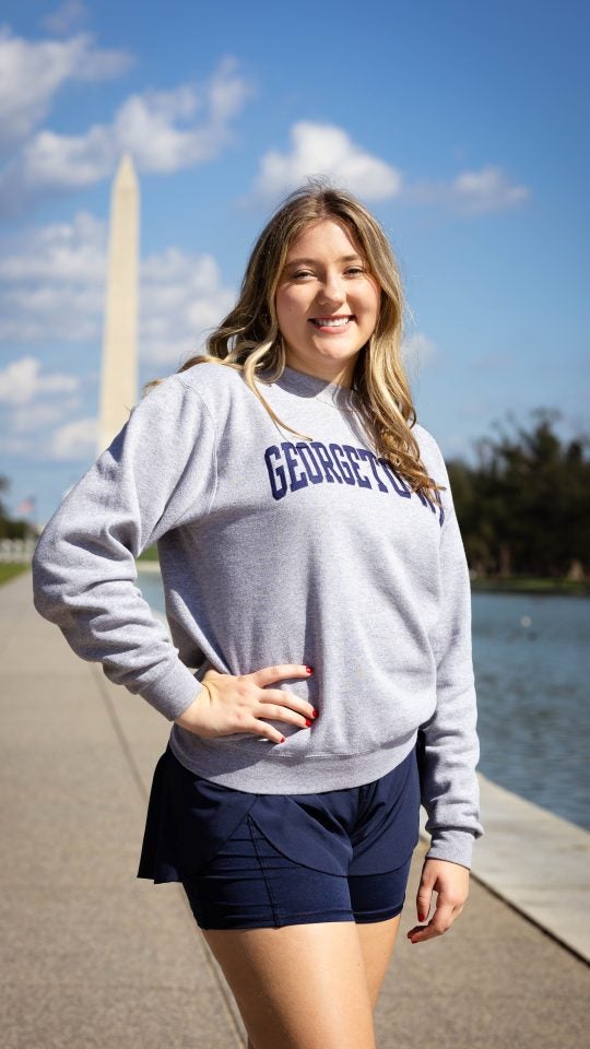 Ninabella in a grey GU sweatshirt on the National Mall