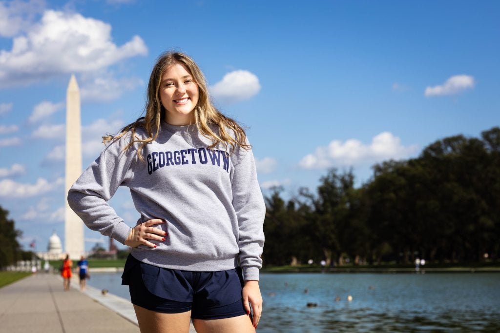 Ninabella in a grey GU sweatshirt on the National Mall
