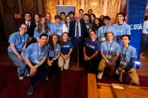Bernie Sanders with a group of students at Gaston Hall