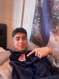 Kiumars with a blanket from high school