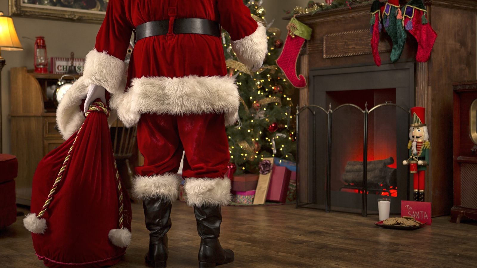 Santa Claus Delivering Presents