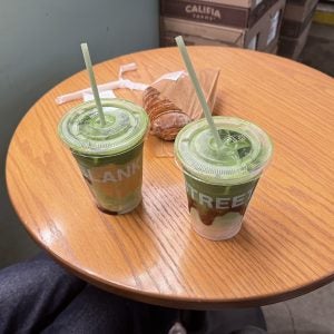 Iced matcha drinks on a table
