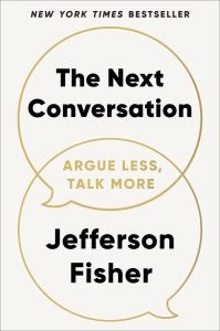 A book cover that says "The Next Conversation: Argue Less, Talk More"