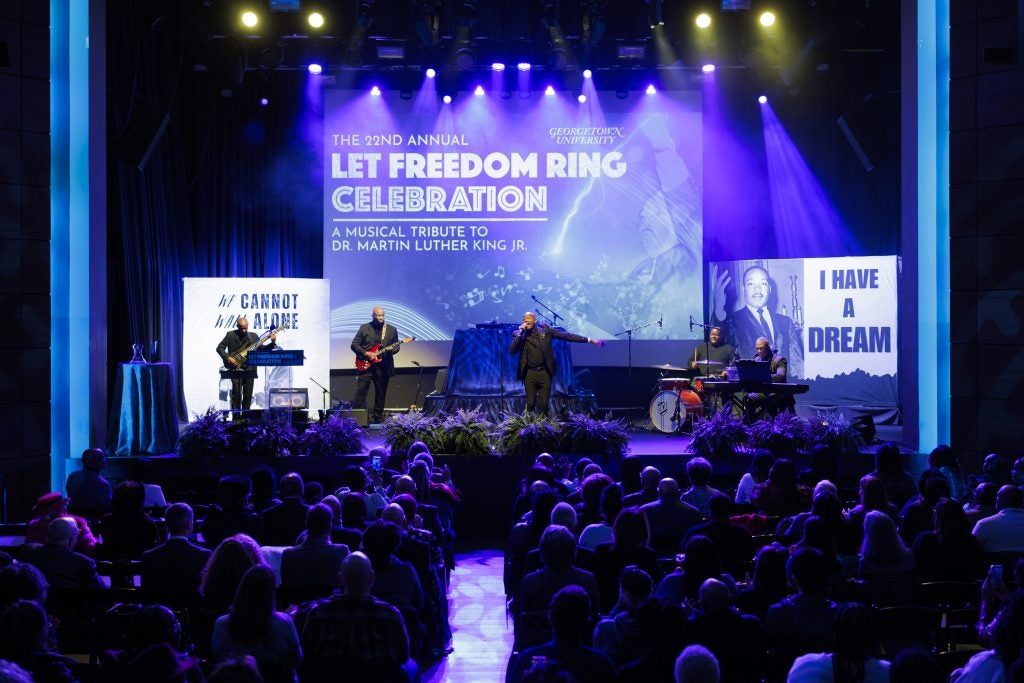 A group of performers on stage