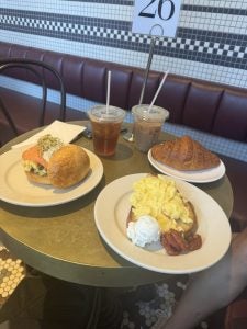 Three plates with breakfast food
