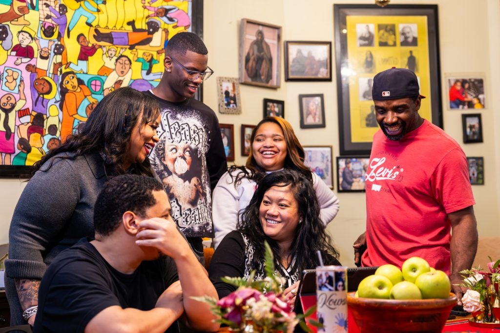 A group of people around a dining table