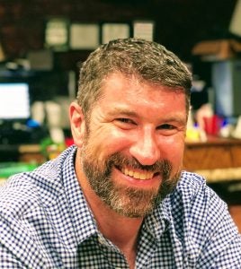 Bearded Caucasian male smiling