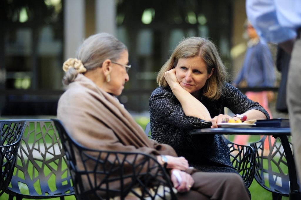 Liz Magill sits with Supreme Court Justice Ruth Bader Ginsburg