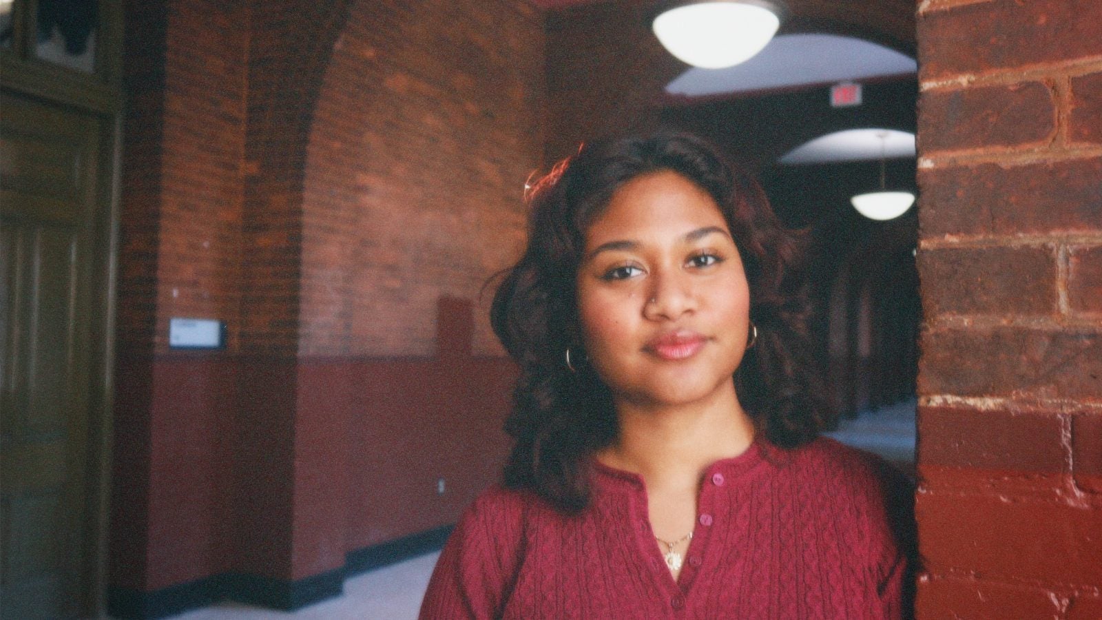 Young woman in red shirt