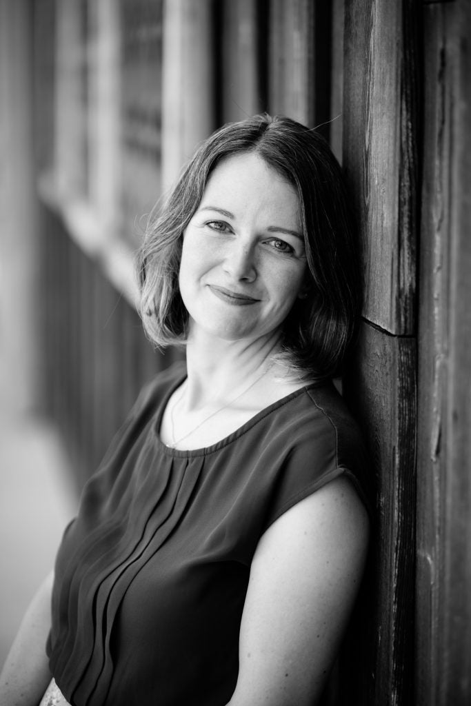 Black and white portrait of caucasian woman smiling