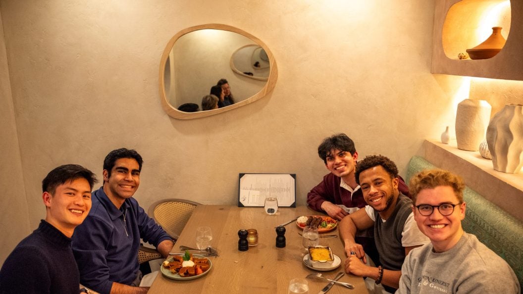 Five young men at a restaurant