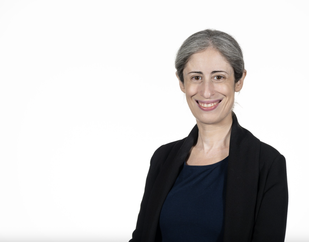 Middle aged Caucasian woman wearing a black blazer