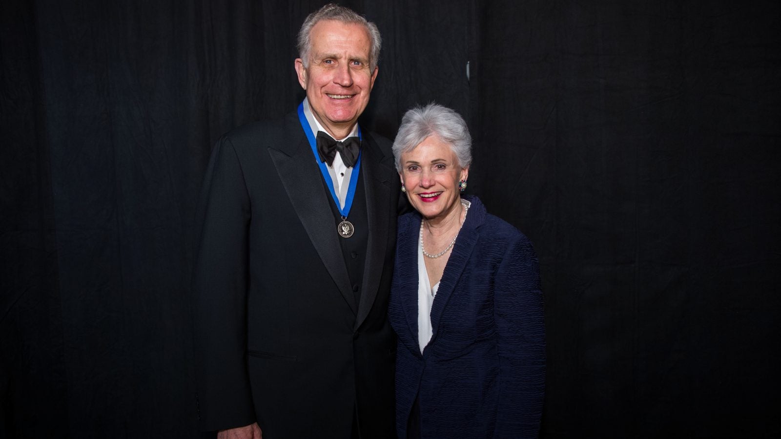 Paul and Chandler Tagliabue in formal attire