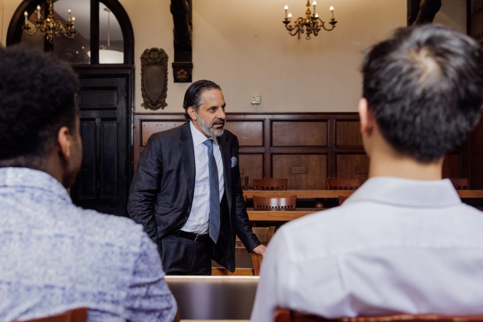 President-elect Eduardo Peñalver speaks to a group of students in a classroom