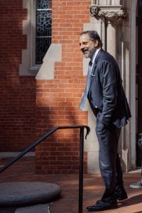 President-elect Eduardo Peñalver greets students while visiting campus in April.