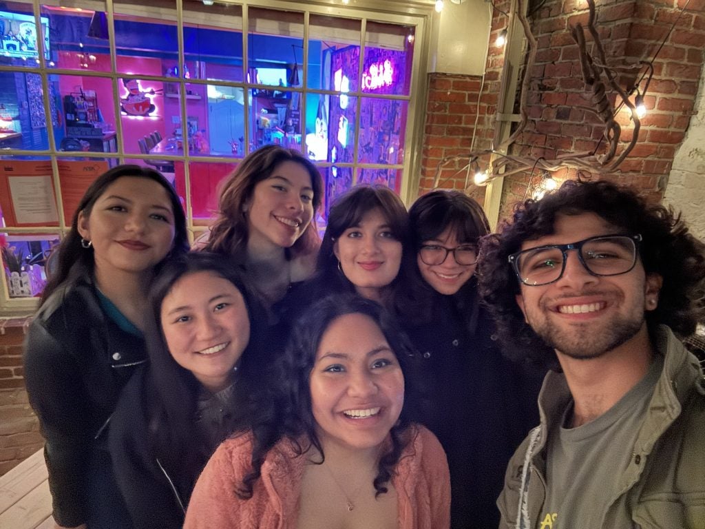 A group of college students smiling