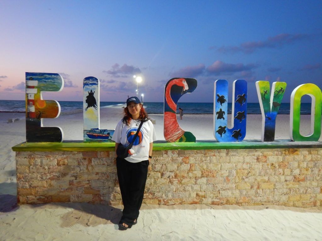 Young Asian woman after sunset in Mexico