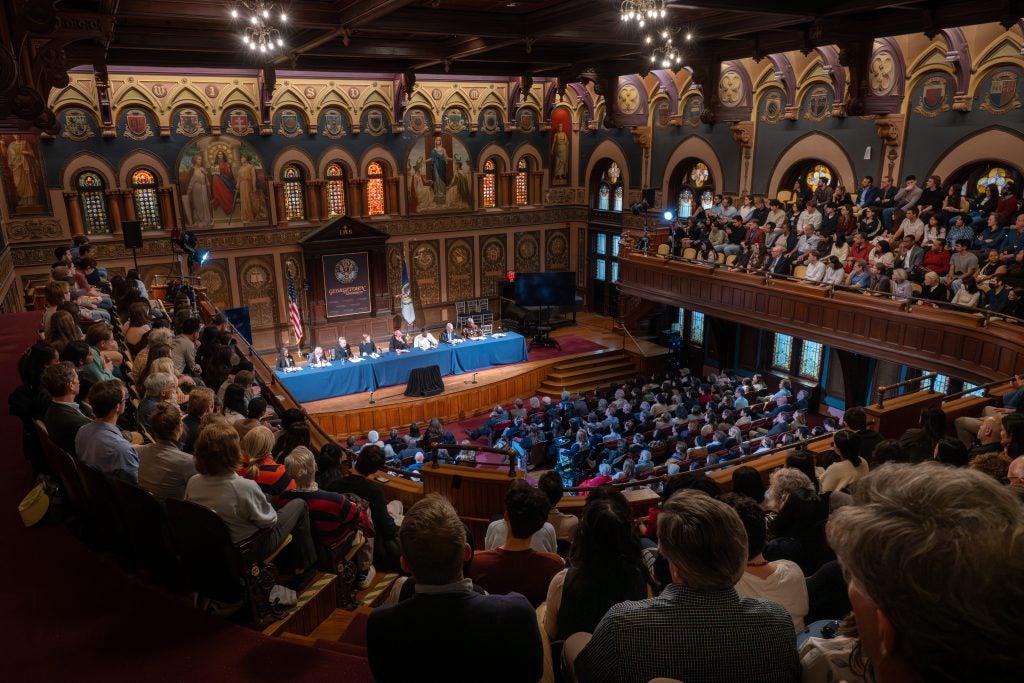 A packed Gaston Hall with view from the balcony