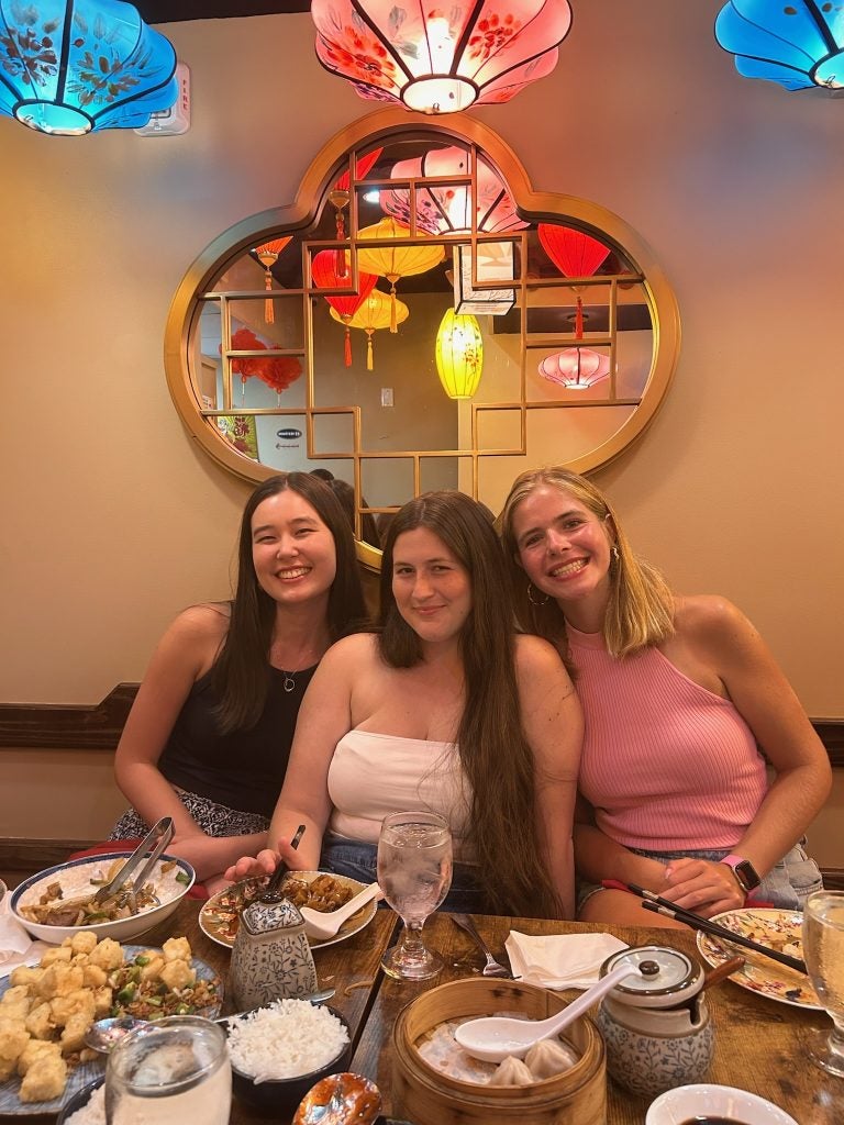 Three young women at a Chinese restaurant