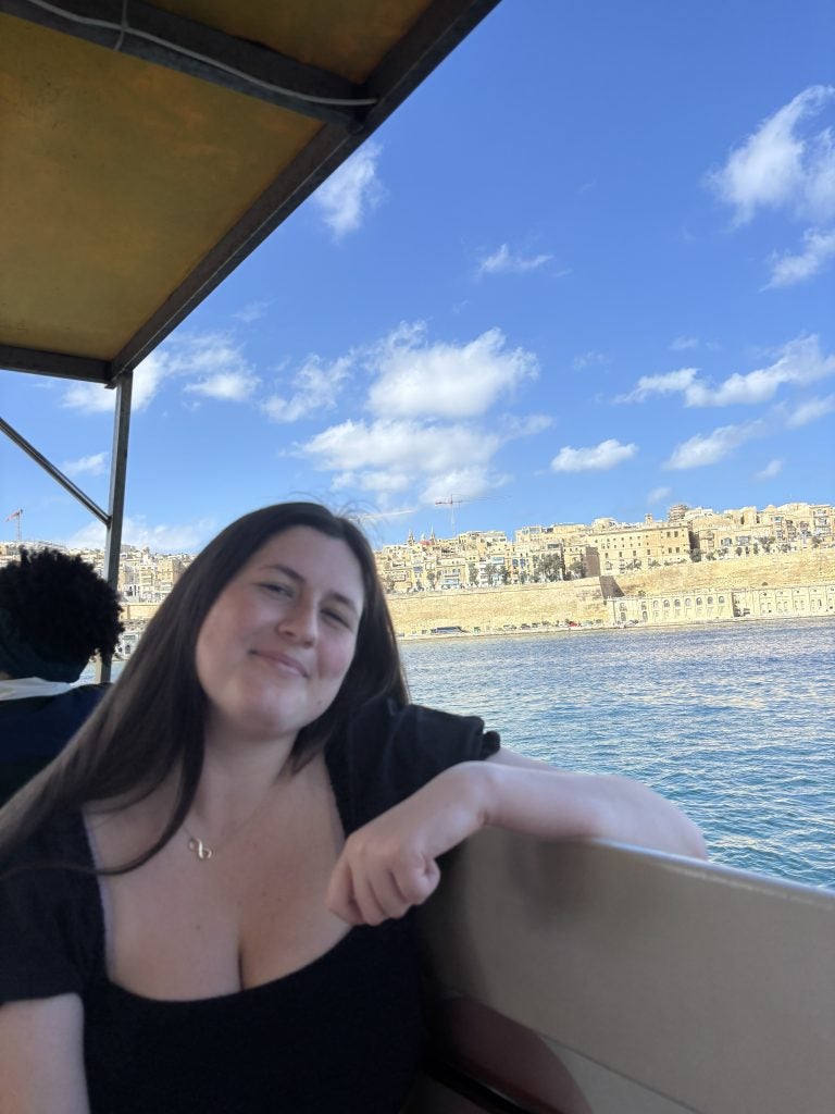 Young Caucasian woman on a boat