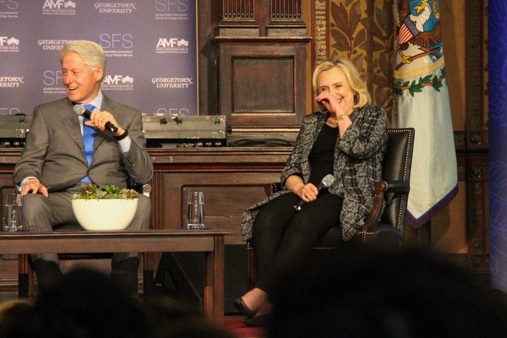 Bill and Hilary Clinton on a panel in Gaston Hall